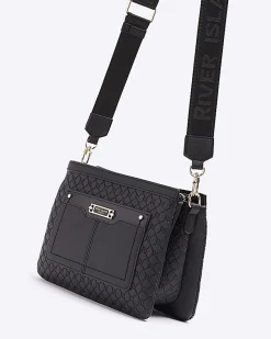 Black embossed monogram cross body bag