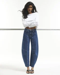 Blue Mid Rise Seamed Raw Hem Barrel Jeans