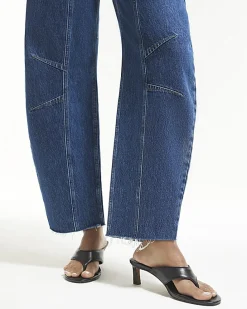 Blue Mid Rise Seamed Raw Hem Barrel Jeans