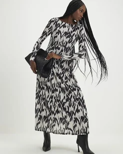 Cream Animal Print Long Sleeve Maxi Dress