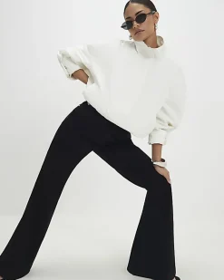 Petite Black High Rise Relaxed Flare Jeans